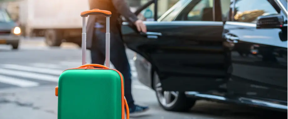 General People Taking Taxi From An Airport And Loading Carry On Luggage Bag To The Car image